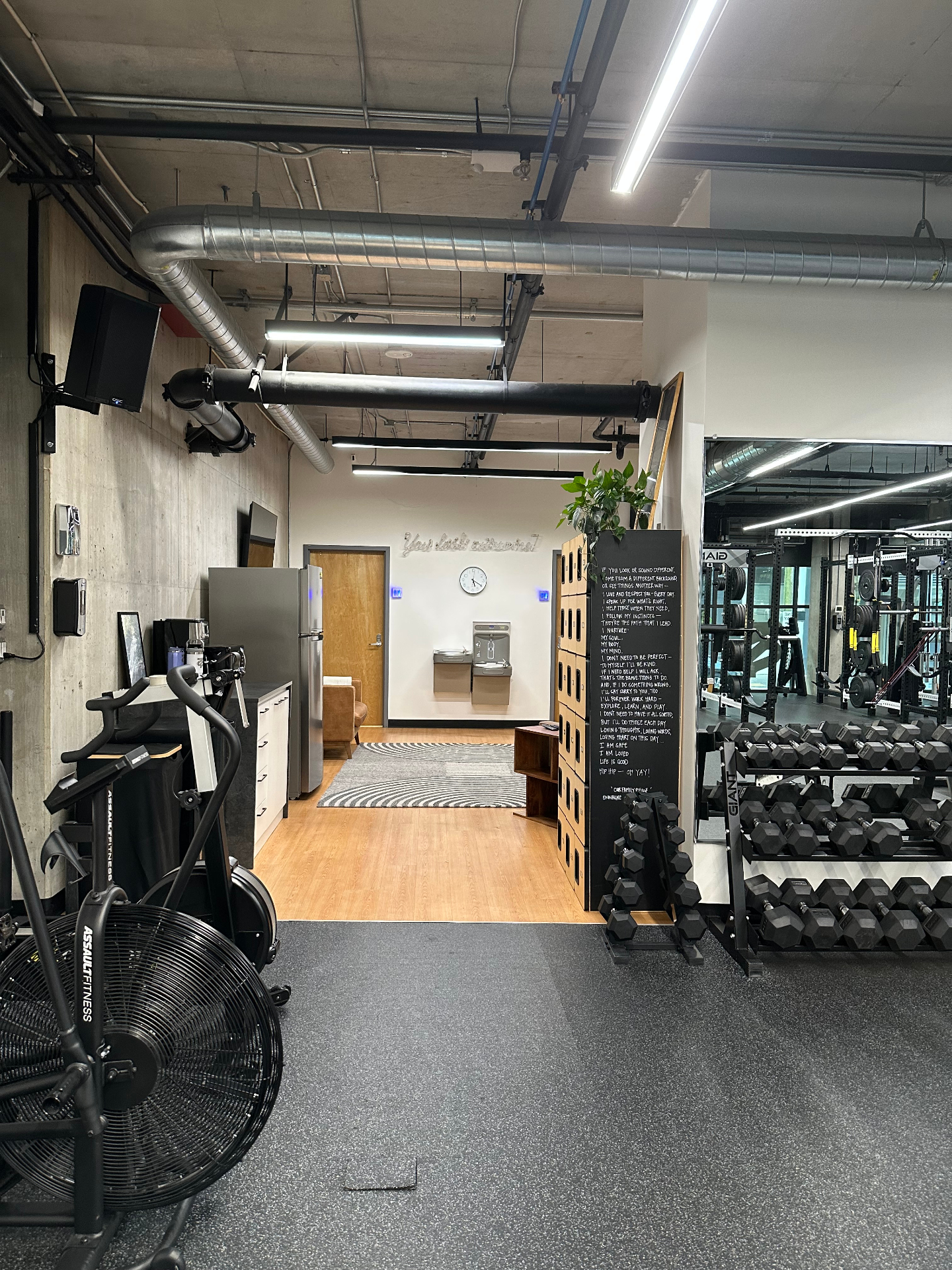View toward the entry lounge and training floor at TRAIN Seattle